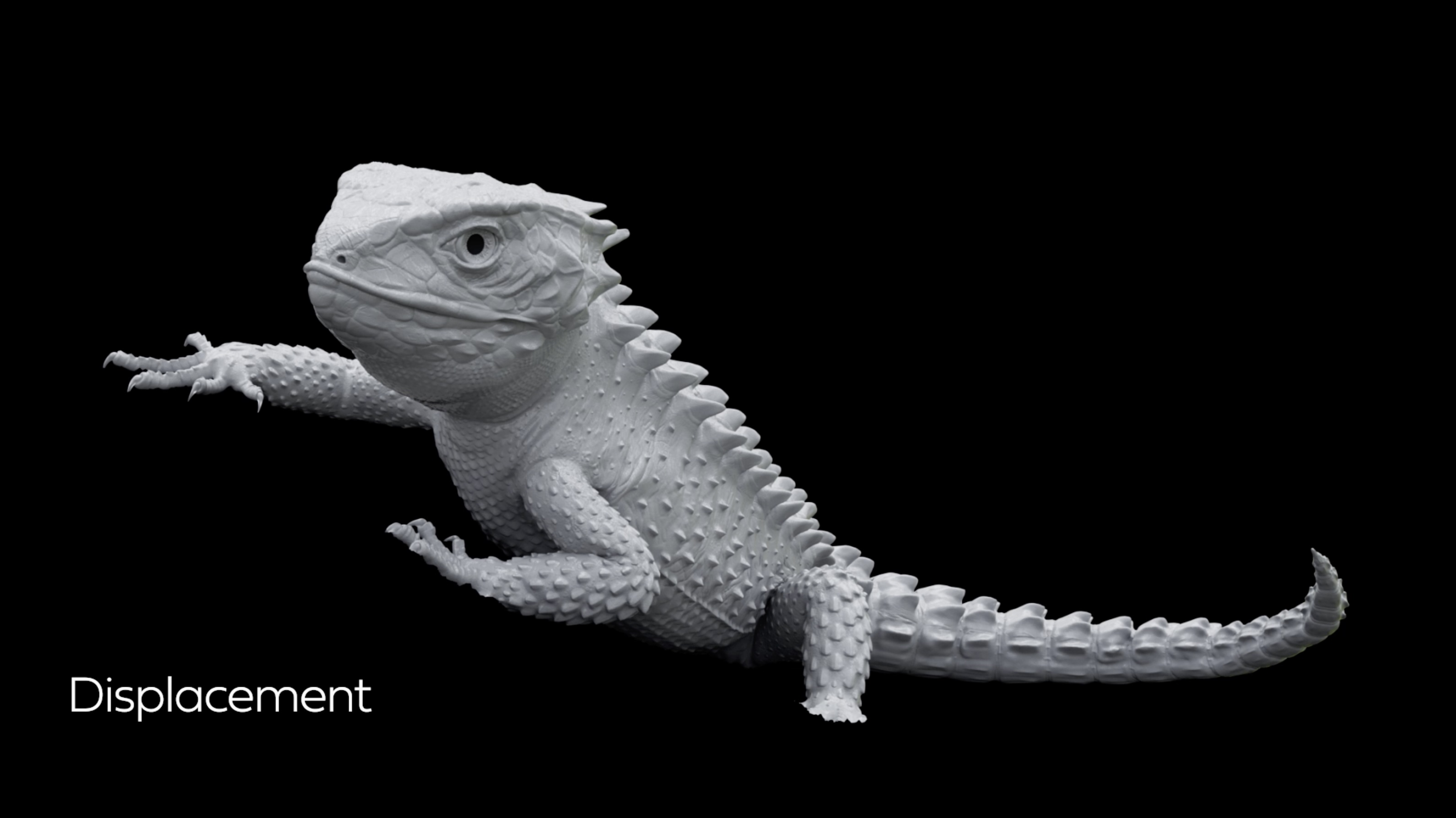 A grayscale reptile model showing displacement detail across its scales.